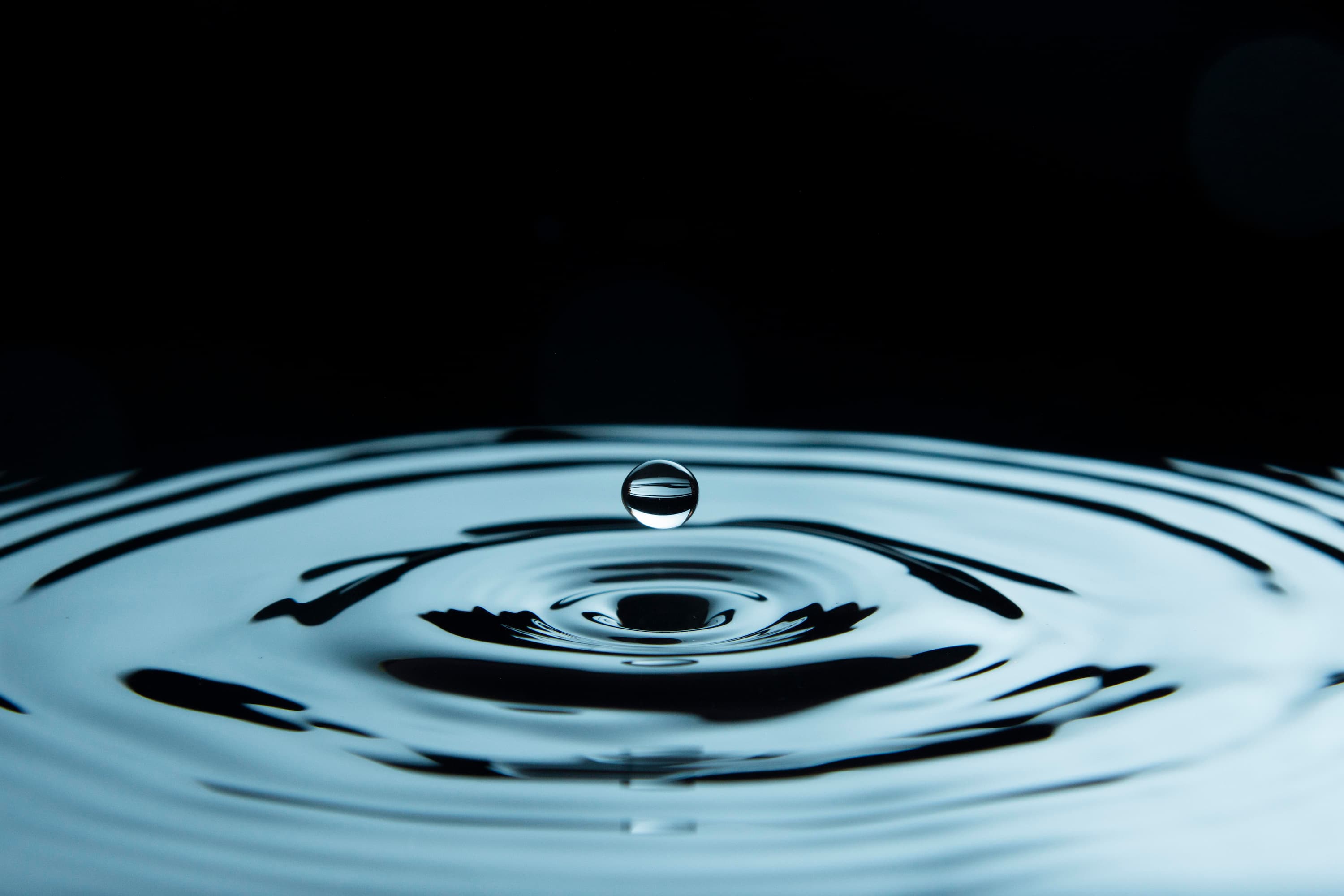 H₂O as a Critical Factor in the Adhesion and Durability of Protective Coatings